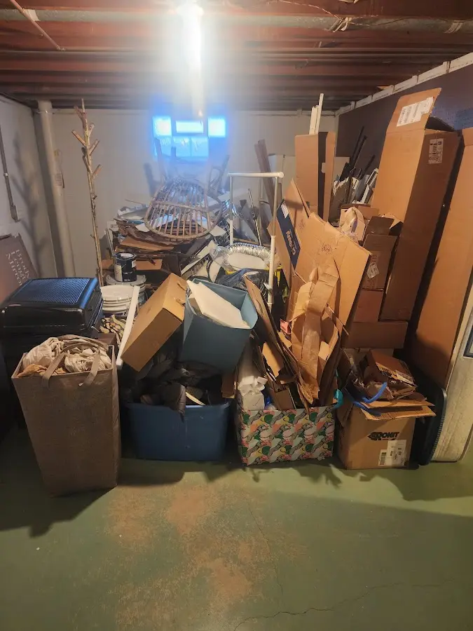 Roll-off dumpster container at job site for 6 Yard Dumpster Rental in Lawrence